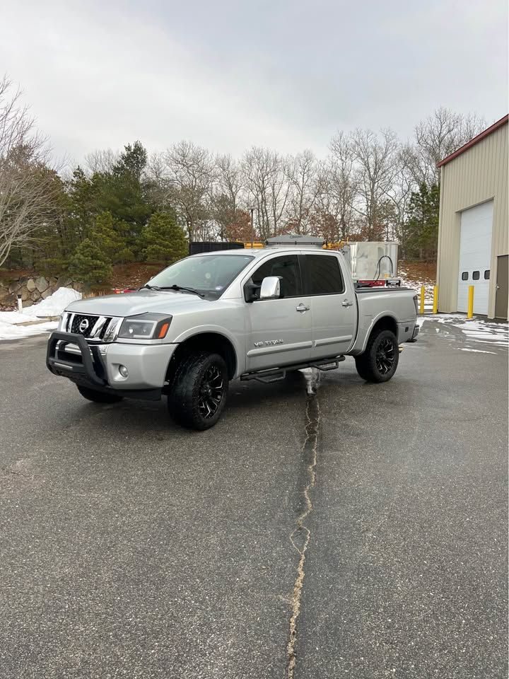 Silver 2013 Nissan Titan SL pickup